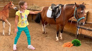 Sofia and Max play with Daddy at the farm and feed the animals