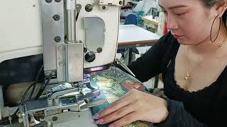 She is Sewing Button Key Hole Machine