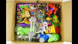 Box of Toys: TMNT,￼Big Hero BAYMAX,Play Doh,MINECRAFT,Zombie Zity,Tom and Jerry