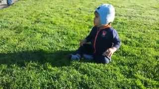 Funny: Baby afraid to touch grass