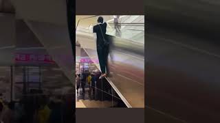 Funny escalator dude