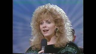 Reba McEntire - "We Need A Little Christmas"