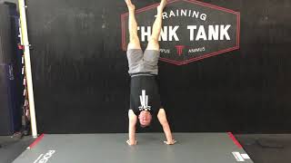 Back to Wall Handstand Shoulder Shifts w: Hand Lifts