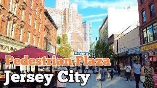 Walk tour inside Newark Avenue Pedestrian Plaza in Jersey City, New Jersey, USA