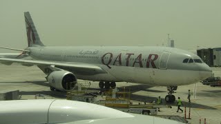 EK B77W & QR A332 at DXB taxiing to/from gates in a blistering 43c, footage taken from Concourse D.