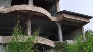 Unfinished abandoned hotel, Dulan