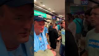 Man City fans enjoying themselves before the kick-off in the FA Cup Final