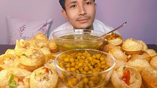 eating spicy Pani puri and matar ghugni