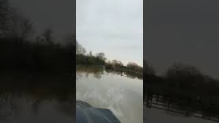 High Lift Landrover Defender 90 in a flood