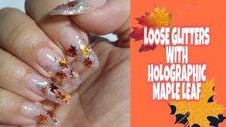 fall nail design: loose glitters with holographic maple leaf 🍁🍁🍁