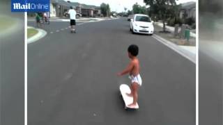 He's not even wearing any shoes! Skateboarding baby!