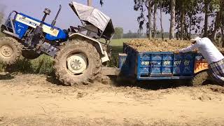 Swaraj 744 tractor stuck with trolley. स्वराज 744 ट्रैक्टर क्या निकल पाएगा ट्राली लेकर चलो देखें।