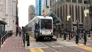 NJT Hudson-Bergen Light Rail - Kinkisharyo LRV #2051 (Ad Wrap) departing Exchange Place