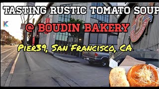 Tasting a rustic tomato soup with sourdough croutons at Boudin Bakery @ Pier39 , San Francisco, CA