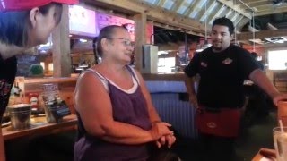 Sue riding the birthday saddle at texas roadhouse