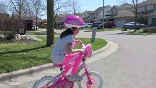 Learning the Basics of Riding Her Bike, April 2016, 7yo