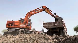 Loading Soil into Trolley