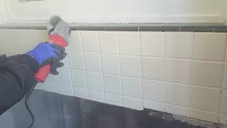 milwaukee power tools diamond cutter cutting through concrete and tiles grout