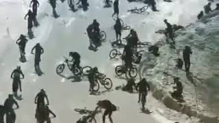 WCGW riding bikes down a glacier