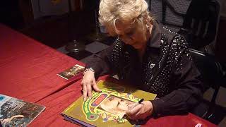 Country musician Connie Smith signing autographs