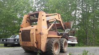 Moving a walk behind mower with the Case 1845c skid steer