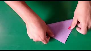 Origami dog face, envelope and a house