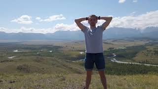 Relaxing man in Kurai steppe on North-Chui ridge