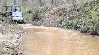 Electric golf cart in water going deep yamaha jakes 6 inch lift