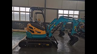 China excavator 2.5 ton OULIDE W25-5 working with Kubota mini digger for demolishing concrete ground