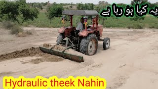 Tractor working on the back balad performers Fiat  Tambe ki khichai