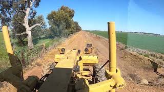 Cat140G grading drain in Canola Australia.254