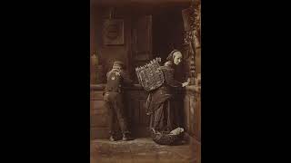 Old woman and boy in a shop, Scotland 1888. (Photo by Adam Diston)