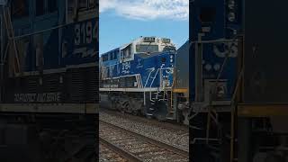 CSX SD70MAC with 3194 law enforcement trailing