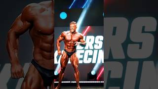 Urs dancing on stage while posing #shorts #bodybuildingmotivation #viral