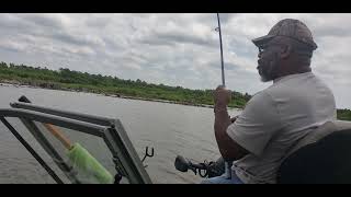 Catching big Catfish on the river. Got to tire them out.