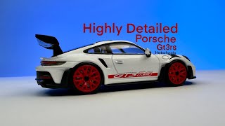 Porsche 992 GT3rs in red and white hotwheels scale model