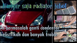 jazz ganti condensor, cuci evap,kelistrikan sampai ganti uppertank radiator..