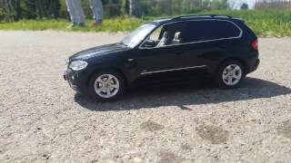 Bmw X5 e71 RC toy Rastar 1:14 driving outdoors. Battery operated.