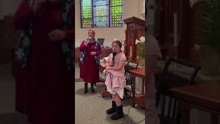 Victoria and mom singing We Believe by Newsboys