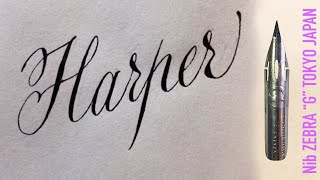 With a Japanese sharp pen, ZEBRA G, I write the name Harper in calligraphy handwriting.