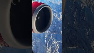 Flying close to the world's second tallest mountain range with best views on planet Earth