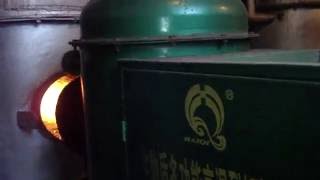 Sawdust burner for hot water, sawdust heating equipment, sawdust furnace, sawdust burning equipment