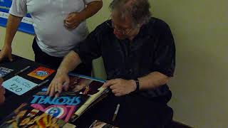 John Sebastian from The Lovin' Spoonful signing autographs - TopSignatures.com