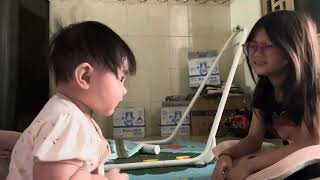 Baby playing with sister #baby #babygirll #cutebaby #babyshorts