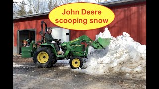 John Deere 3038E compact tractor video - SCOOPING SNOW WITH BUCKET