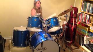 Gracie learning a drum beat