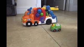 VTech Go! Go! Smart Wheels! Car Carrier with convertible.