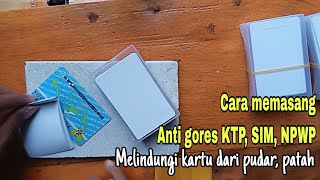 Cara memasang anti gores KTP.