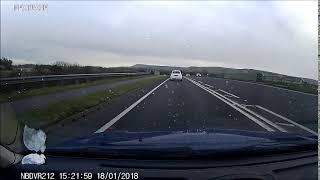 A27 crazy driver decides to come across the hatchings & straddles the double white lines