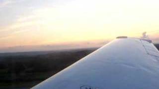 mooney takeoff at dusk